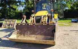 Burmistrz Miasta i Gminy Opatowiec ogłasza przetarg ustny nieograniczony na sprzedaż Koparko-ładowarki marki KOMATSU WB93R w wersji kabinowej, rok produkcji 2006 r. 3